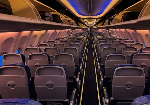 Air China Boeing 737-800 economy cabin looking aft along the three-by-three seating