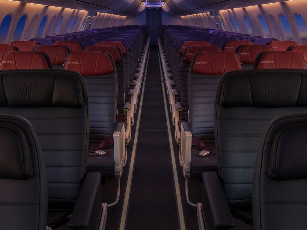 Virgin Australia Boeing 737-700 cabin with Business seats and red Economy X headrests