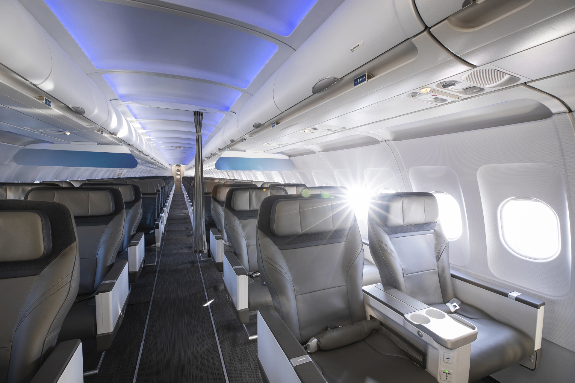 Alaska Airlines Boeing 737 MAX 8 First Class cabin with Boeing Sky Interior mood lighting