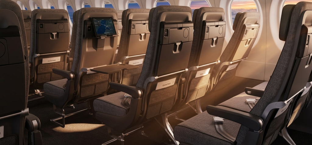 QantasLink Airbus A220-300 economy cabin looking down the aisle in 2-3 seating