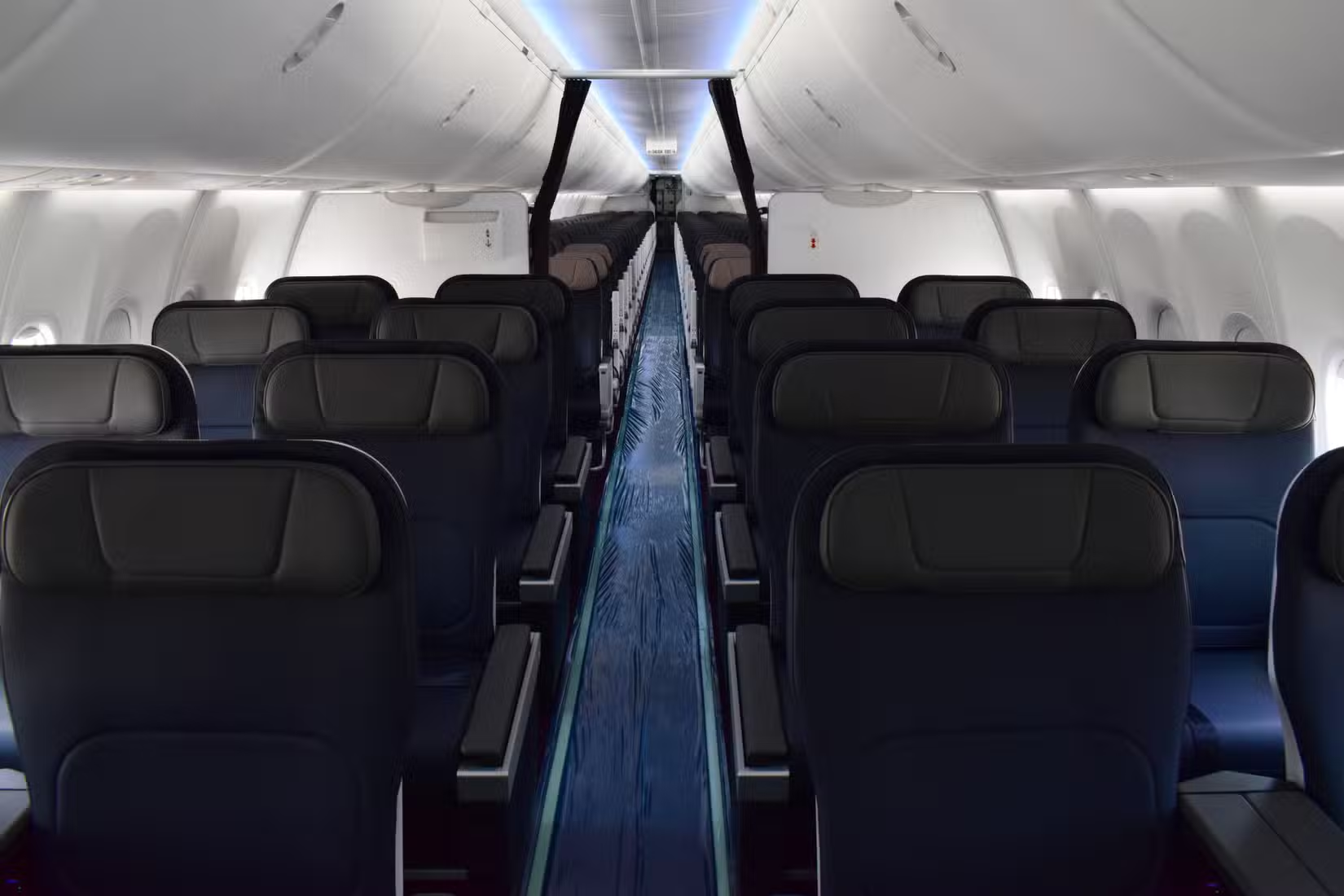 Aeroméxico Boeing 737-800 economy cabin looking down the aisle in 3-3