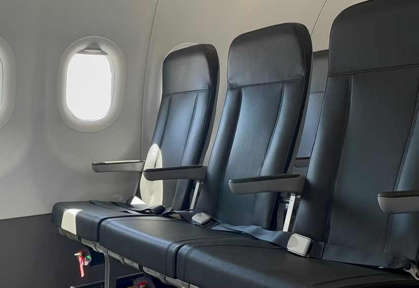 Frontier Airlines A320neo economy cabin with black leather seats