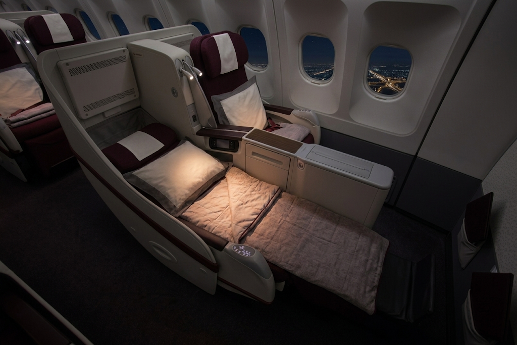 Qatar Airways A330-300 Collins Diamond business class seat in lie-flat mode